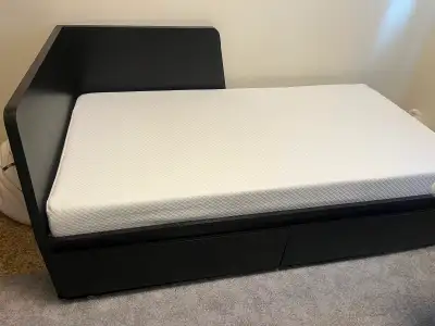 IKEA daybed and mattress. Has two large drawers, View more