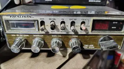 Early 80's Radio Shack Realistic CB radio. It's well used but works great. It includes the mic, no a...