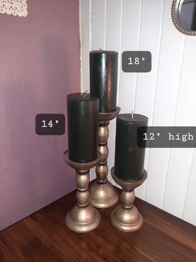 3 sizes, forest green candlea on gold colored pedestles