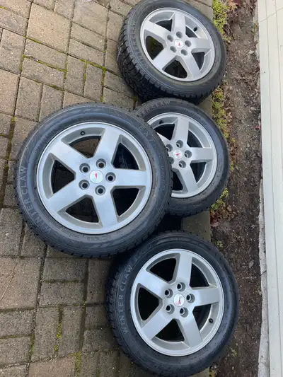 Selling a set of four 16-inch Pontiac wheels that have been powdercoated for a sleek, durable finish...