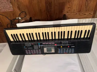 Yamaha PSR-220 Electronic Synth Action 61-Keys Portable Keyboard, View more