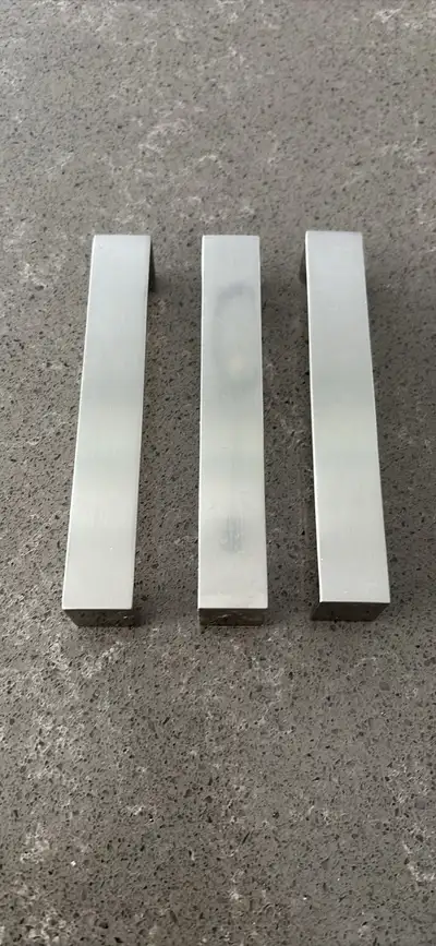 Stainless steel cabinet pulls (52 pieces) Measurement: From screw to screw is 5inches The actual han...