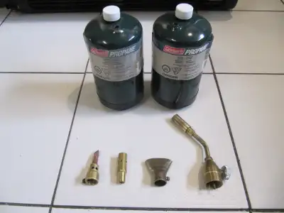 Up for sale is a seven piece lot of Coleman Propane Cylinders and Brass Fittings. Part of a business...