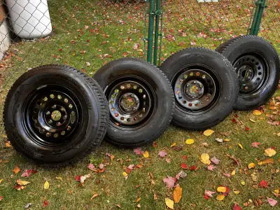 For sale 4 winter tires and rims - 255 70R 17. Tires were on a GMC Sierra.