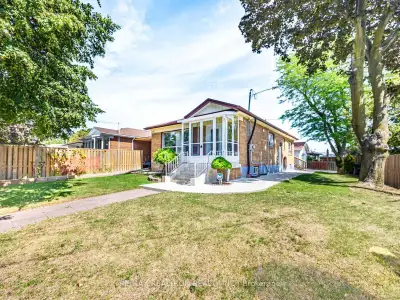 Stunning Sun Filled Home With New Kitchen & Countertops, New Porch, Wooden Deck & Extra Wide All Fen...