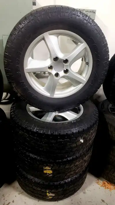 TOYO A/T OPEN COUNTRY M+S Tires on rims. - 265/60R18 109T - 75% Thread - 18H2X8.0J - Offset: ET50 -...