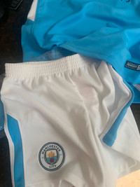 Manchester City child’s kit jersey, shorts and socks