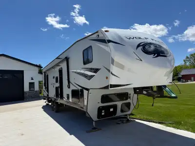 Adventure-ready and loaded with features! Selling my well-maintained 2022 Forest River Cherokee Wolf...