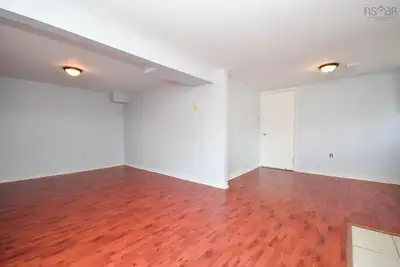Spacious one bedroom for rent, studio layout, partially furnished (dresser/tv stand, optional single...