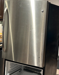 Older fridge for pick up (scrap metal)