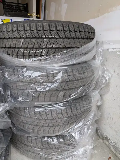 Selling Bridgestone Blizzak WS90 91H 1122 195/65R15 Winter Tires which I purchased from Costco. Used...