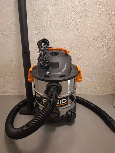 Brand new unused Ridgid shop vac. Contact Glenn @ 416 423 4383.