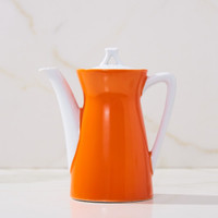 Orange MCM tea pot made in Japan! 