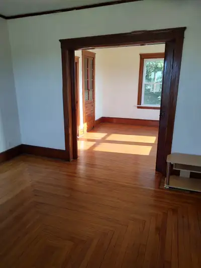 1 bedroom main floor apartment, large livingroom & bedroom, 4 piece bathroom, small office space(den...