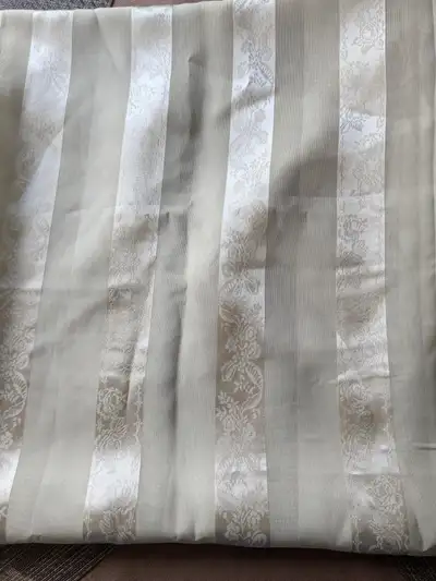 Have a very light Pea green sheer shower curtain like new. Very pretty and very neutral colour $5