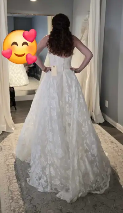 For sale: brand new wedding dress, never worn except for store try-on. This stunning gown features a...