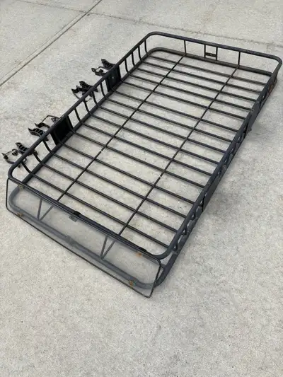 Extended roof rack with required hardware. I took it off our SUV as I have a truck now and don’t nee...