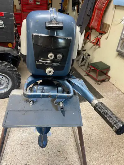 This vintage motor still runs. The stand is not included. 5.5 HP