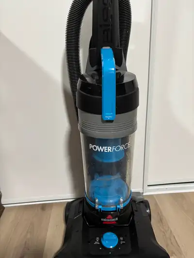 This Bissell PowerForce upright vacuum is great for carpets and bare floors, featuring powerful suct...