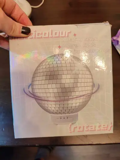 Get ready to boogie with this multicolour rotating disco ball light, complete with seven vibrant col...