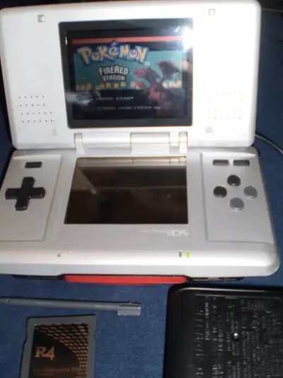 Nintendo DS NTR-001, White with R4 card with stylus and AC adapter working, with excellent screen co...