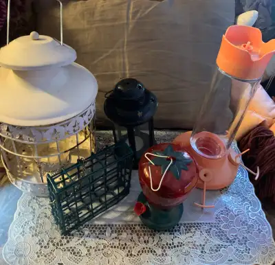 A bundle of bird feeders and tea light lantern , View more