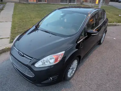 2014 Ford C-Max Energi HYBRID FWD, 4 Cyl. 2.0L Automatique, elle est toute équipée avec vitres et mi...