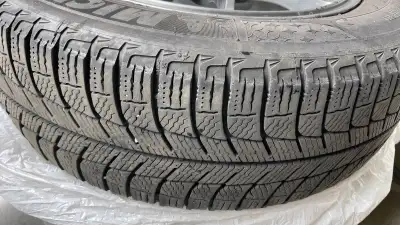 A set of 4 Michelin X-Ice Winter tire 205/60/R16 on 16” Aluminium Wheels good for Mitsubishi, Toyota...