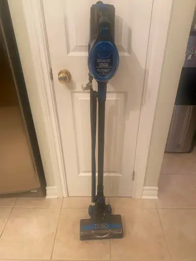 One Shark Rocket stand up vacuum cleaner with accessories . Excellent condition,like new.