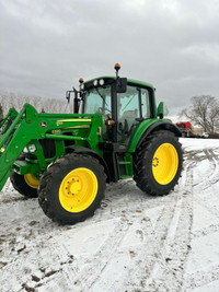 John Deere 6330 tractor with loader