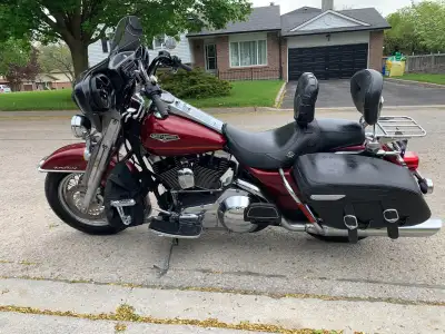 2001 Harley Road King. Original Windshield and handlebars available. Comes with bike lift and extra...