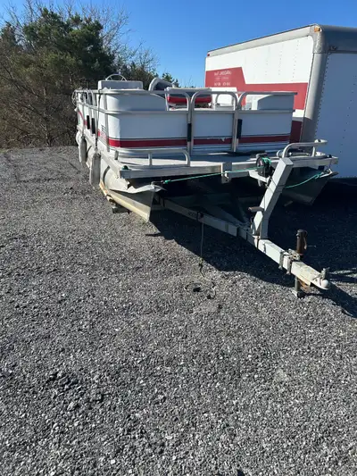 1994 pontoon boat with trailer , runs and floats comes with trailer $7000 obo located in port perry
