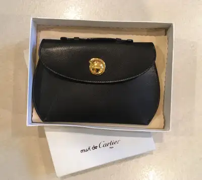 VINTAGE Pochette à monnaie must  Cartier, View more