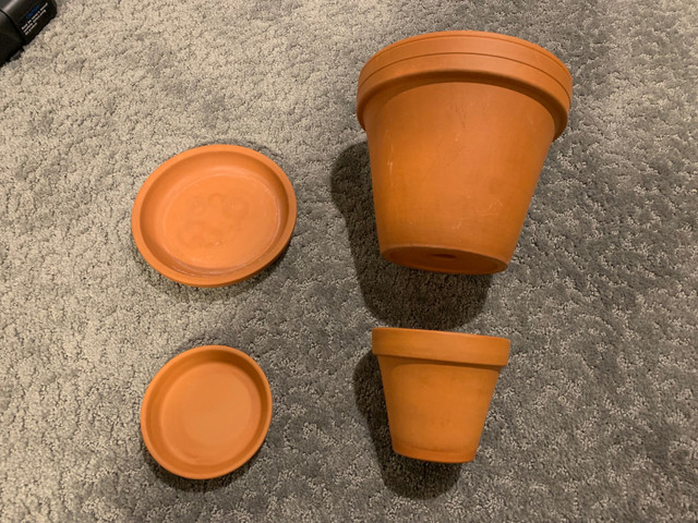 Terracotta Pots with Plates in Other in Calgary