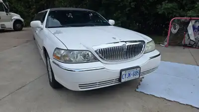 2007 Lincoln Town Car L executive sedan stretched limousine by Executive Coach Builders (ECB); only...