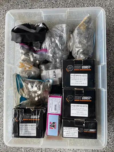 I have a Tupperware container with about 11 full sets of lug nuts. Some have lock lug nuts with the...