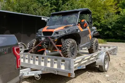 Polaris. Aluminum. Utility Trailer. 2015. Ownership on hand. Tool box, alot off ties down, 7 pin con...
