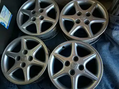 Selling a complete set of (4) wheels from a hard-to-find 2001 Nissan Sentra SE (Sport/Performance pa...