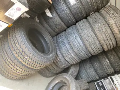 Four NEW Bridgestone Dueler AT 275/70R18 tires. Load Range E. text 7806864026