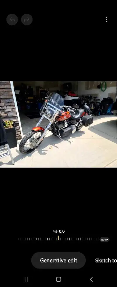 Rev up your engines for this head-turning orange Harley-Davidson motorcycle, a true embodiment of fr...