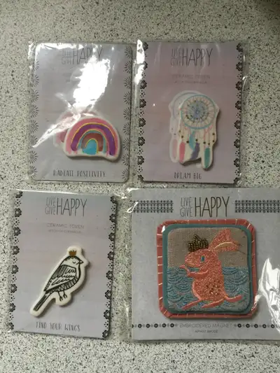3 ceramic tokens and 1 embroidered magnet, View more