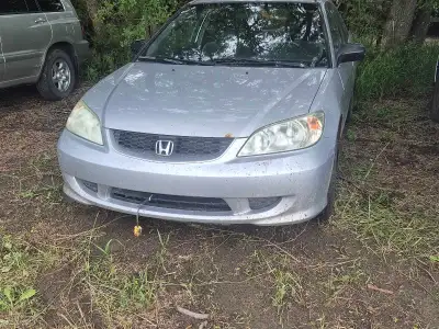 Great 5spd car bought for my kid but she cant drive standard