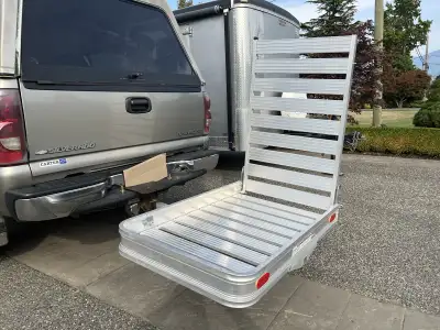 This 50”x 30” aluminum hitch-mounted carrier is perfect for transporting a smaller scooter or wheelc...