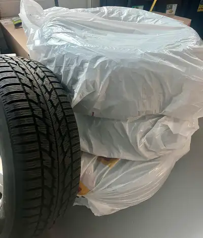 A wonderful set of four (4) matching Firestone Winterforce 2 tires mounted and balanced on Mercedes...