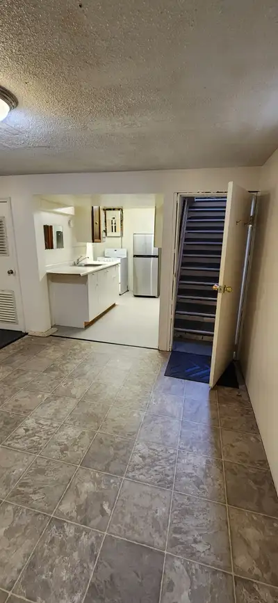 This basement apt has its own entrance this is for a single person close to Nait large living room a...