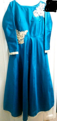 LONG TORQUOISE GOWN.