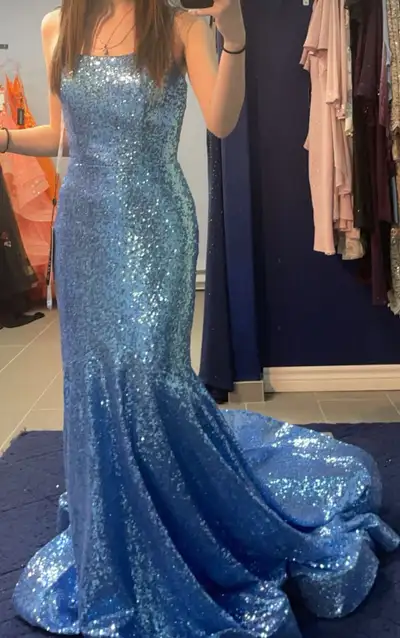 light blue prom dress unsure of the size the length was altered and can be undone long train in the...