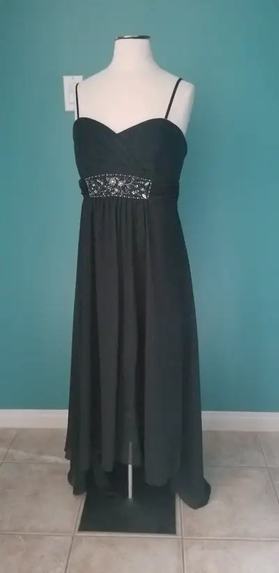 Used once as a bridesmaid dress. As the tag says in the picture it is size 14 from Davids Bridal. I...