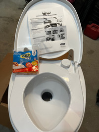 Brand New Portable Toiler for Camping, RV. By Camco 