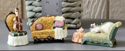 I'm selling a charming miniature furniture set, perfect for dollhouses or collectors! The set includ...